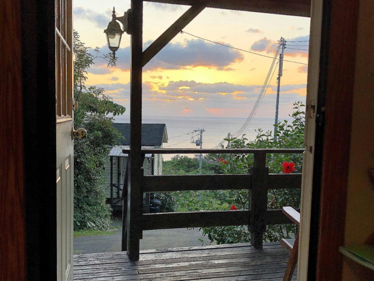 מוטובו Panorama Ocean View Cottage מראה חיצוני תמונה